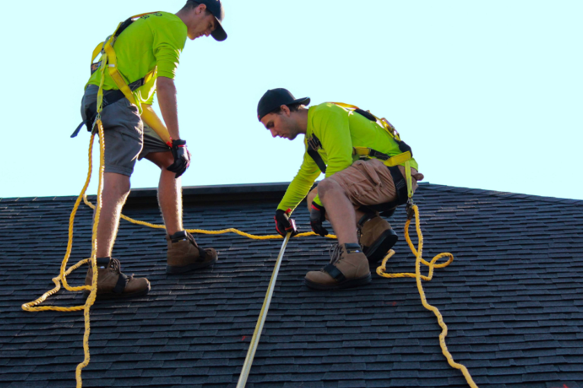 Man repairing roof